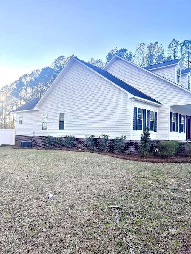 view of side of home featuring a mountain view