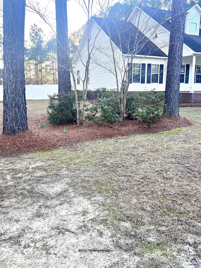 view of yard with fence