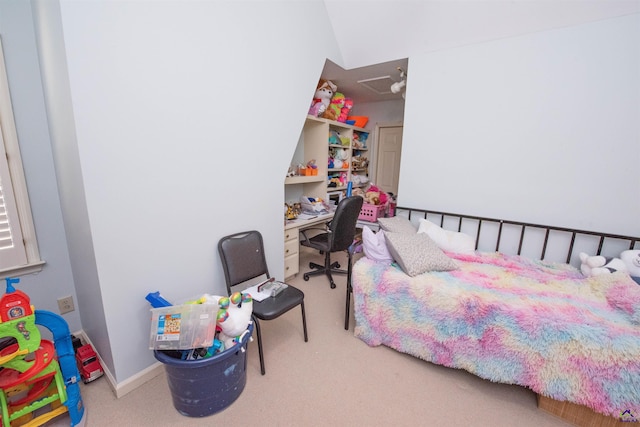 bedroom with carpet and baseboards