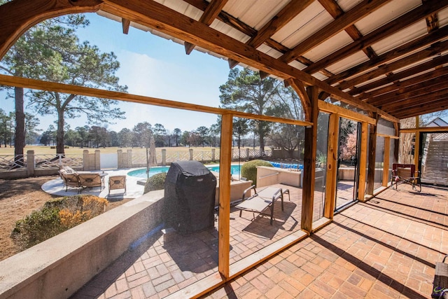 view of patio / terrace featuring fence private yard, an outdoor fire pit, and a fenced in pool