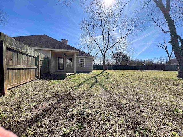 view of yard featuring a fenced backyard