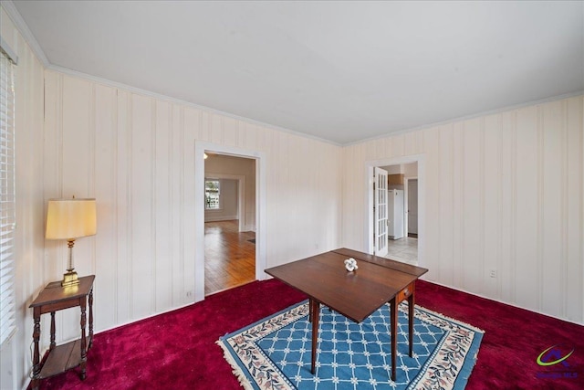 home office featuring carpet and crown molding