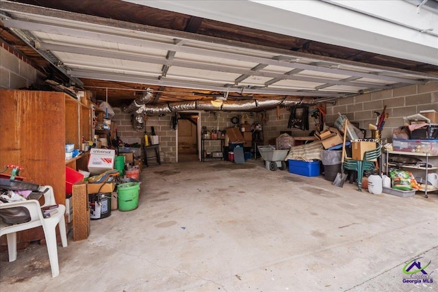 garage featuring concrete block wall