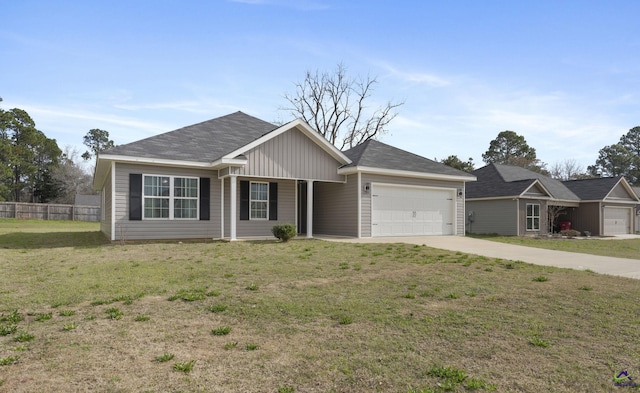 ranch-style home with a garage, driveway, a front yard, and fence