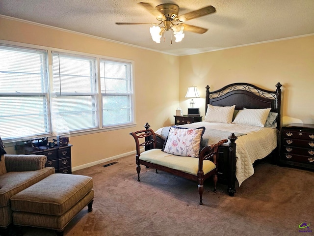 carpeted bedroom with a textured ceiling, a ceiling fan, visible vents, baseboards, and ornamental molding