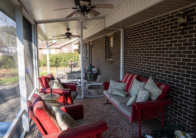 view of patio featuring ceiling fan and an outdoor living space