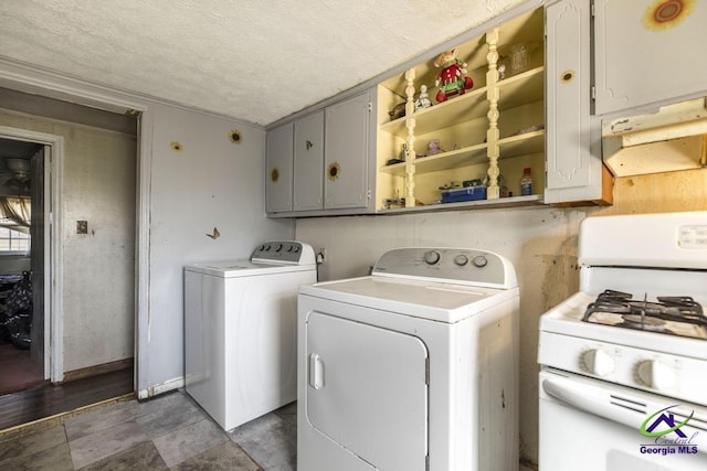 2137 Mutual Ave, Macon, GA 31204 - washroom featuring a textured ceiling, laundry area, and independent washer and dryer