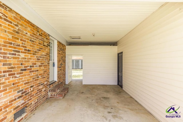 view of patio / terrace featuring visible vents