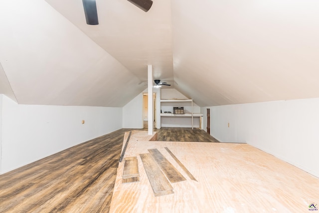 bonus room with vaulted ceiling, ceiling fan, and wood finished floors