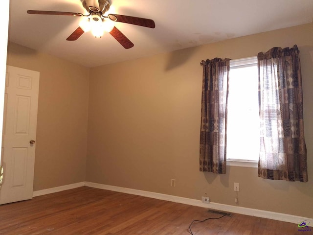 3271 Commodore Dr, Macon, GA 31211 - unfurnished room featuring a ceiling fan, a wealth of natural light, visible vents, and wood finished floors