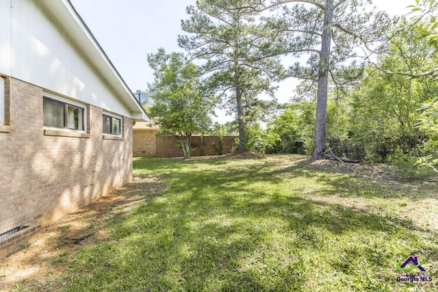 3271 Commodore Dr, Macon, GA 31211 - view of yard featuring fence