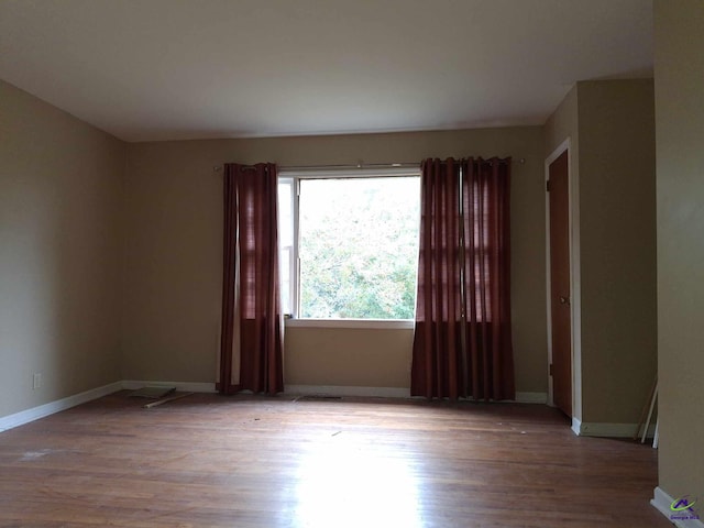 3271 Commodore Dr, Macon, GA 31211 - spare room featuring baseboards and wood finished floors