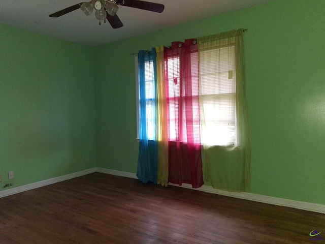 3271 Commodore Dr, Macon, GA 31211 - unfurnished room featuring a ceiling fan, baseboards, plenty of natural light, and wood finished floors