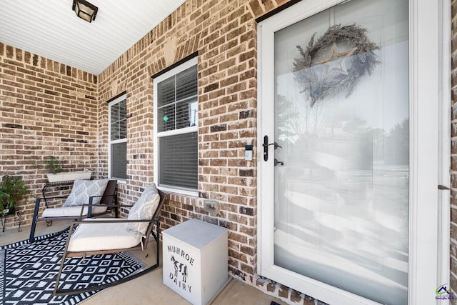 view of patio featuring a porch