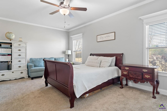 bedroom with light colored carpet, crown molding, baseboards, and ceiling fan