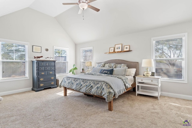 bedroom featuring light carpet, vaulted ceiling, and baseboards