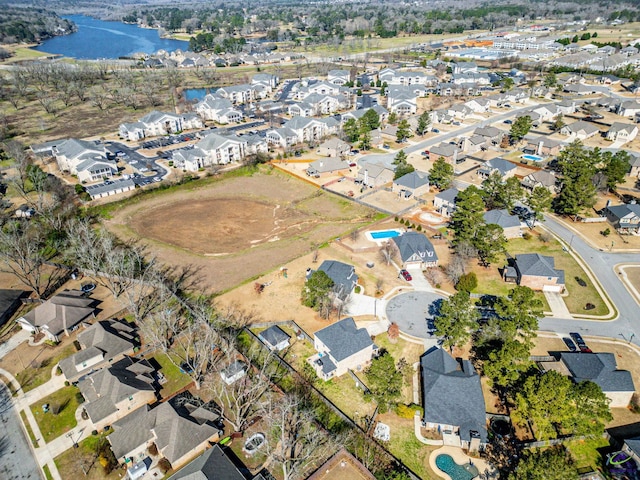 aerial view with a water view and a residential view