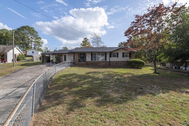 ranch-style house featuring driveway, crawl space, fence, a carport, and a front yard