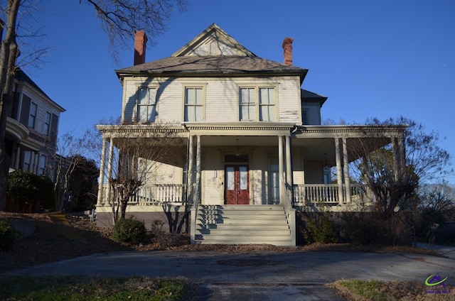 view of front of property featuring covered porch