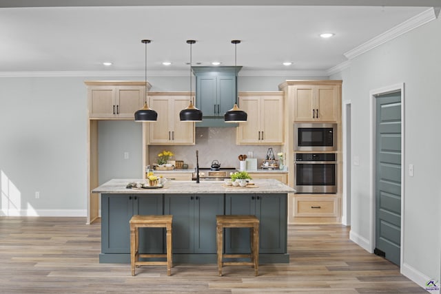 kitchen with appliances with stainless steel finishes, decorative backsplash, light brown cabinets, and light wood-style floors