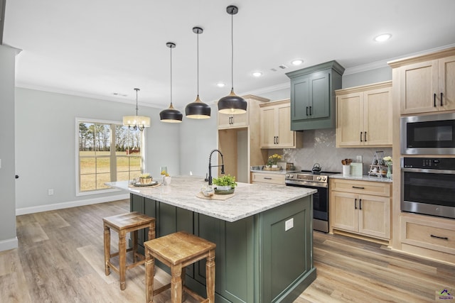 kitchen featuring decorative backsplash, light brown cabinetry, appliances with stainless steel finishes, ornamental molding, and a sink