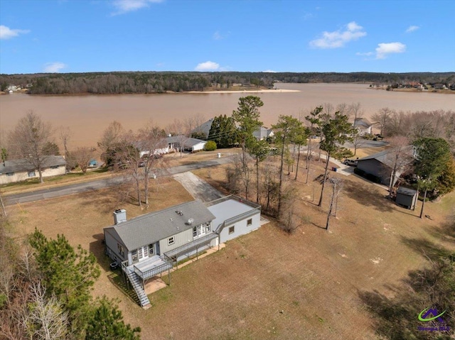 drone / aerial view with a water view