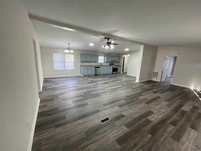 unfurnished living room with dark wood-style flooring, recessed lighting, visible vents, and baseboards