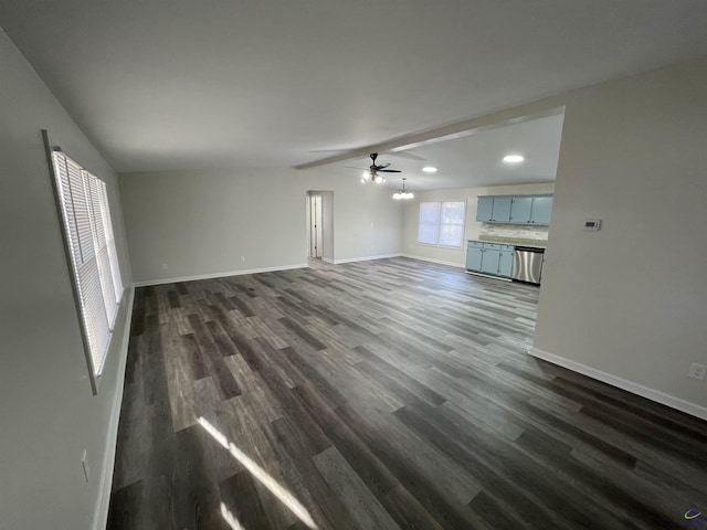 unfurnished living room with baseboards, lofted ceiling, ceiling fan, dark wood-type flooring, and recessed lighting