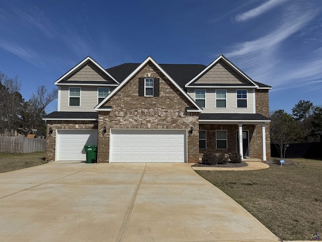 craftsman-style house with driveway, an attached garage, fence, and brick siding