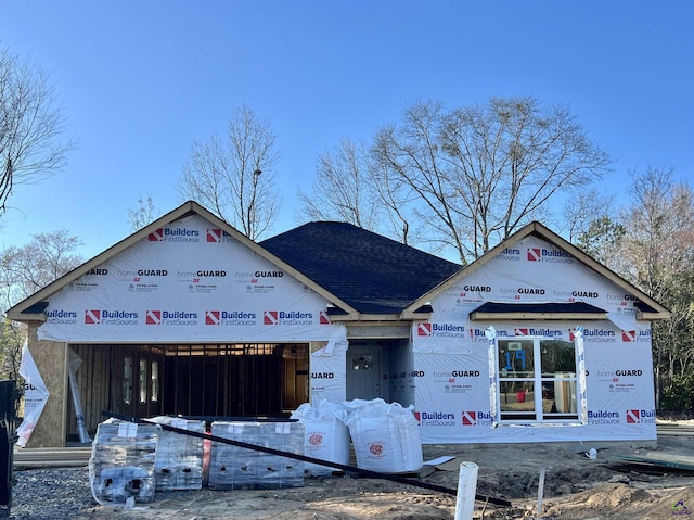 property in mid-construction with an attached garage