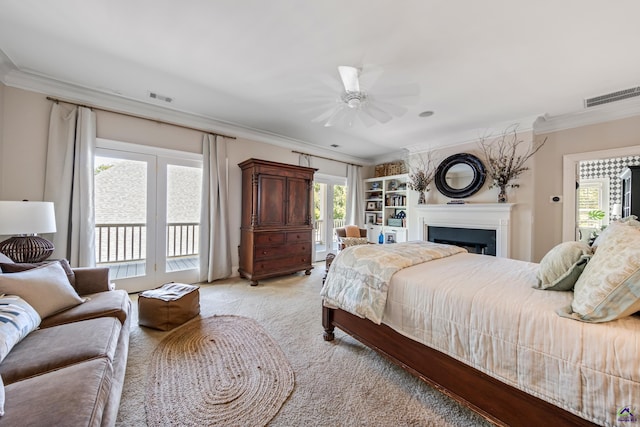 bedroom with light colored carpet, access to outside, visible vents, and ornamental molding