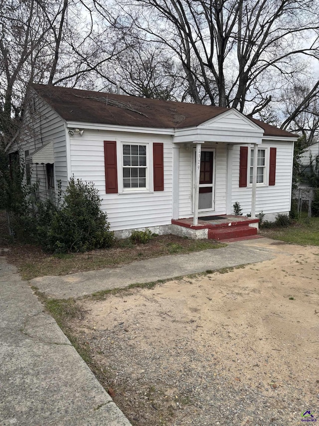 bungalow-style home with a porch