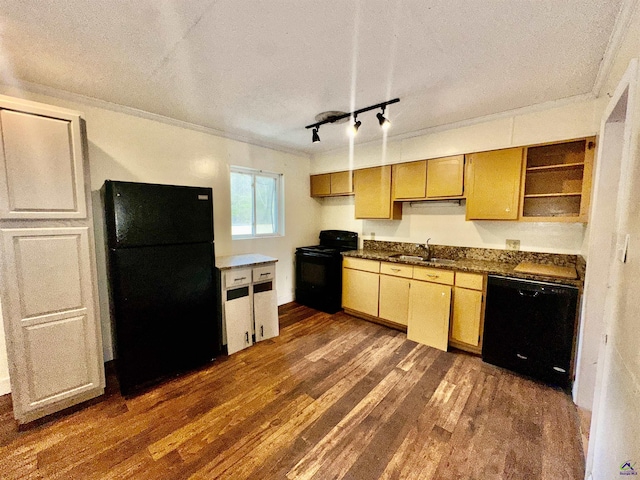 kitchen featuring dark wood-style floors, ornamental molding, a sink, a textured ceiling, and black appliances