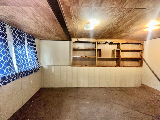 finished basement with wooden ceiling