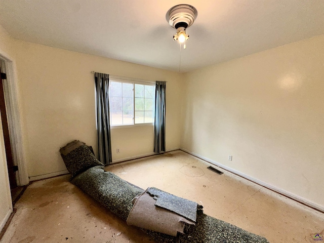 interior space with visible vents and baseboards