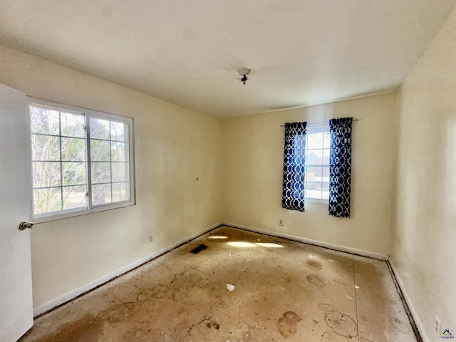 spare room featuring visible vents