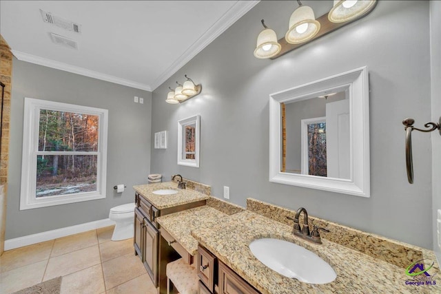 bathroom featuring ornamental molding, visible vents, a sink, and toilet