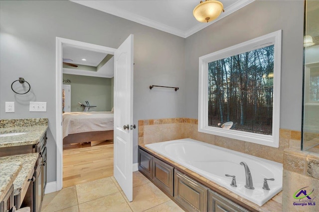 bathroom with a garden tub, crown molding, connected bathroom, vanity, and tile patterned flooring