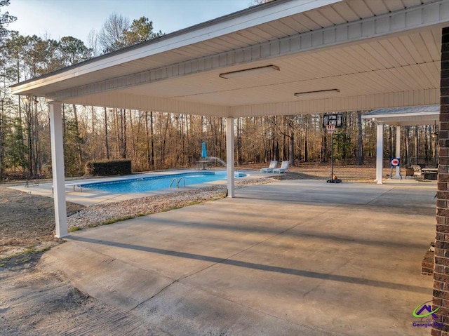 pool with a patio