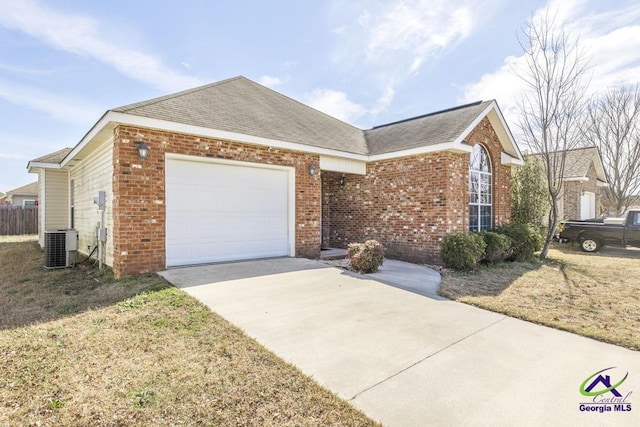 view of front of house with brick siding, roof with shingles, an attached garage, central AC, and driveway