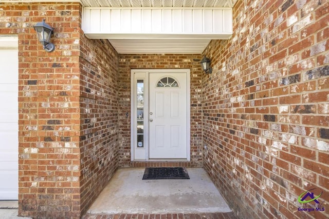 property entrance featuring a garage