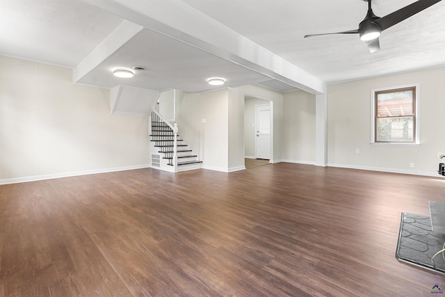 unfurnished living room with ceiling fan, stairway, wood finished floors, and baseboards