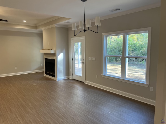 unfurnished living room with baseboards, dark wood-type flooring, a fireplace with flush hearth, and crown molding