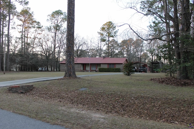 ranch-style house with a front yard