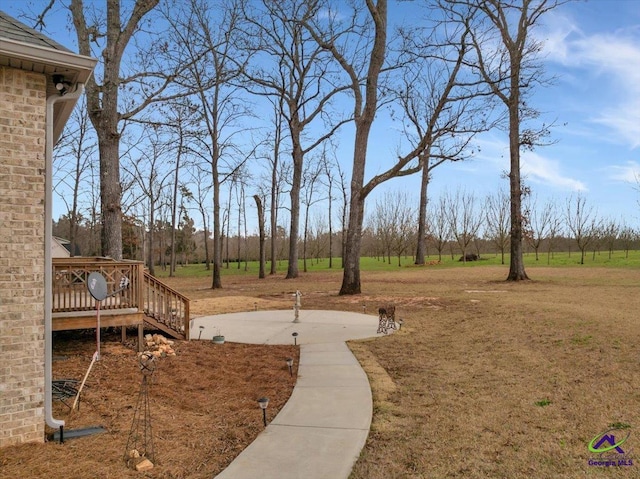 view of yard featuring a deck