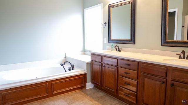 bathroom featuring double vanity, a garden tub, a sink, and tile patterned floors