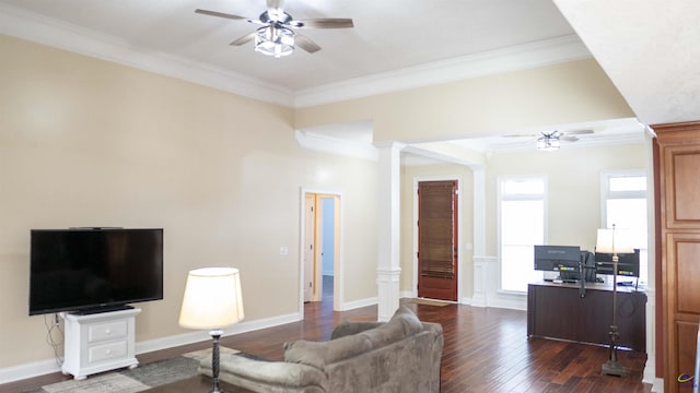 living room with ceiling fan, ornamental molding, dark wood-style flooring, and decorative columns