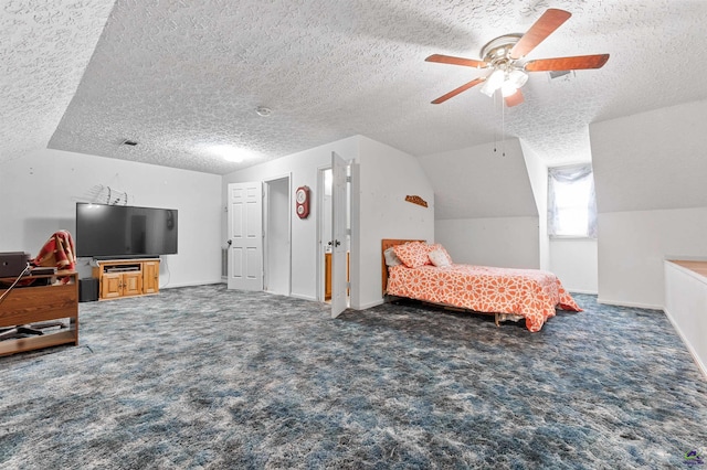 bedroom with carpet, vaulted ceiling, a textured ceiling, and ceiling fan