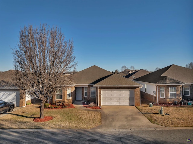 ranch-style home with a front lawn, brick siding, driveway, and an attached garage