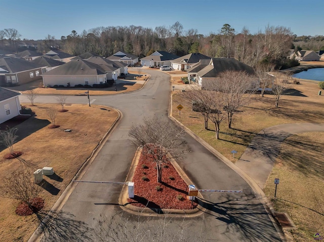 birds eye view of property with a residential view